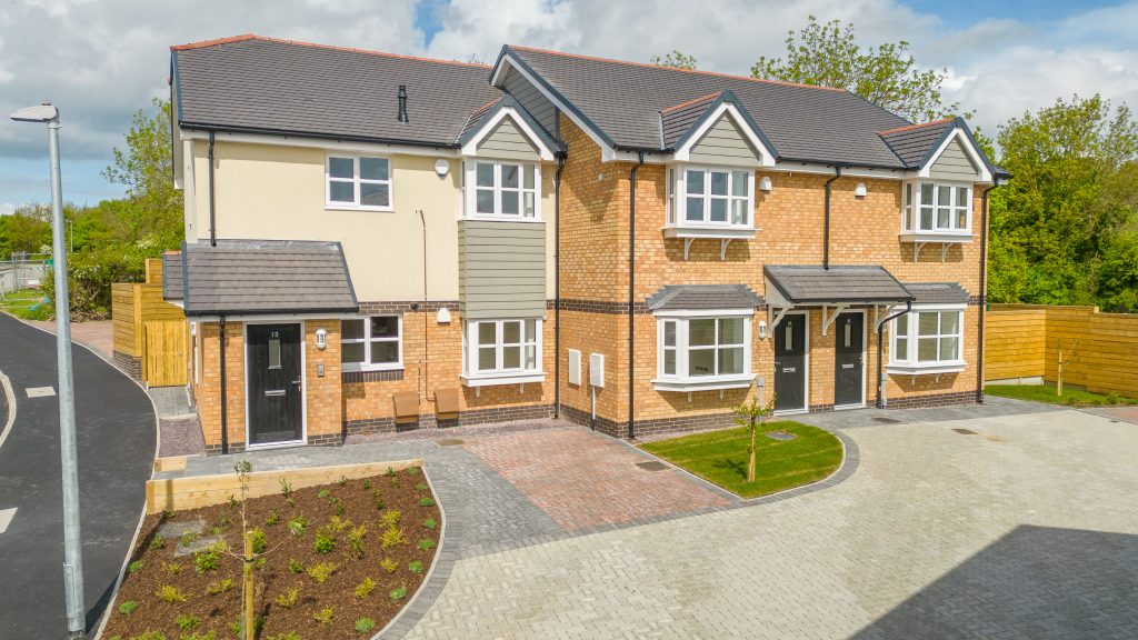 three homes from the front - new builds in narrow lane