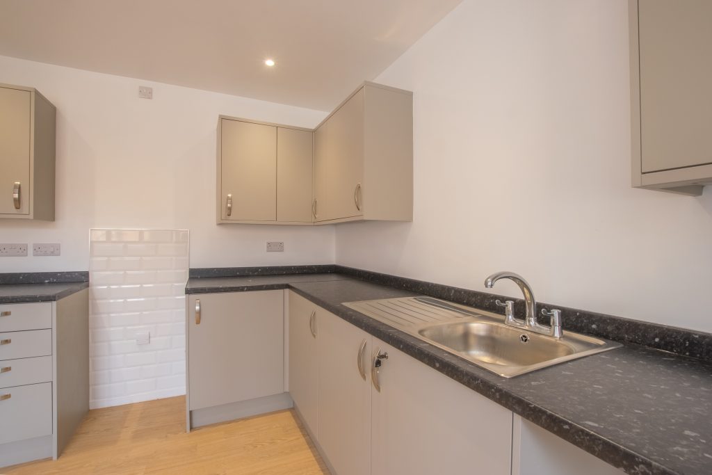 light grey kitchen in new build property