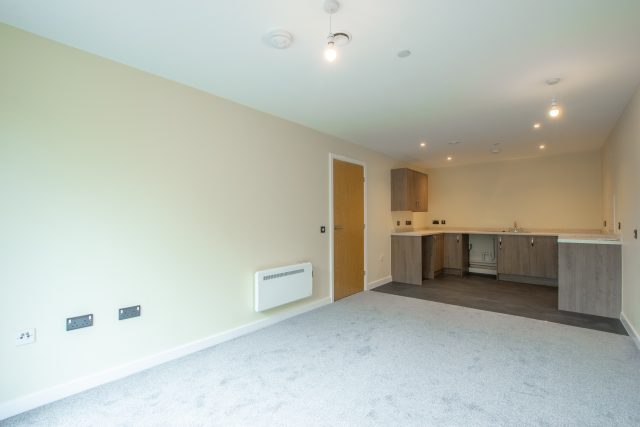 Photo of a open plan living room and kitchen. 