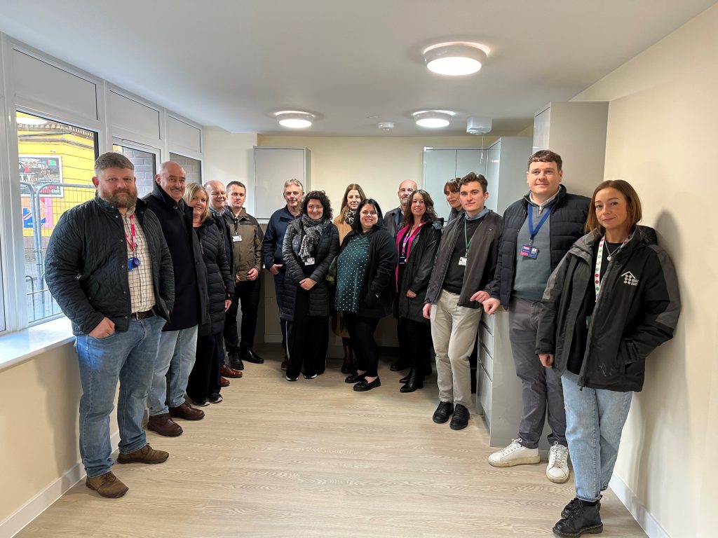 Adra welcoming a delegation from Cyngor Gwynedd and North Wales Housing to see the progress on the development of 137 High Street, Bangor.